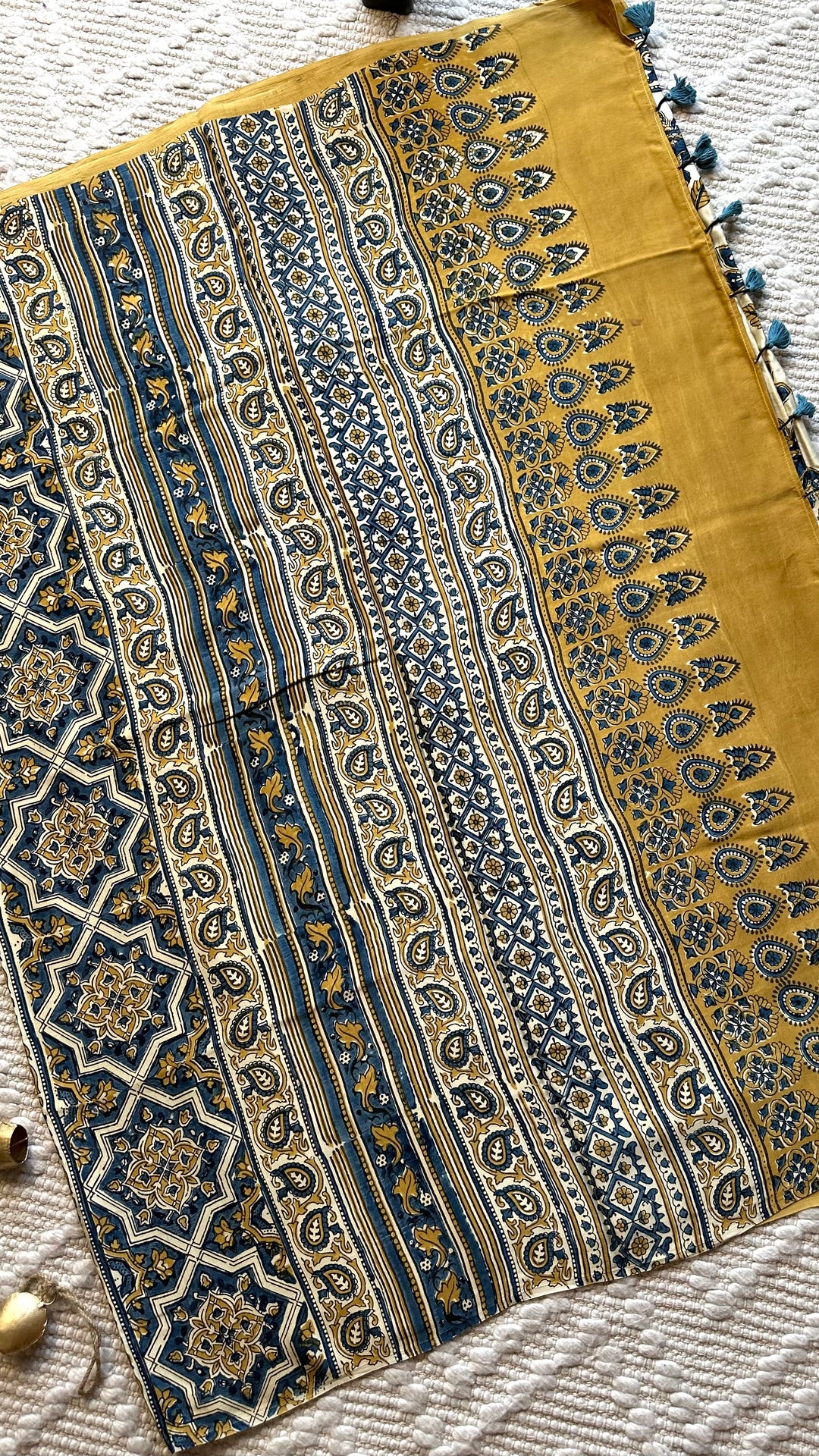 BLOSSOMS ON IVORY- SUPER PREMIUM & BUTTERY SOFT AJRAKH HAND BLOCK PRINTED MODAL SILK SAREE