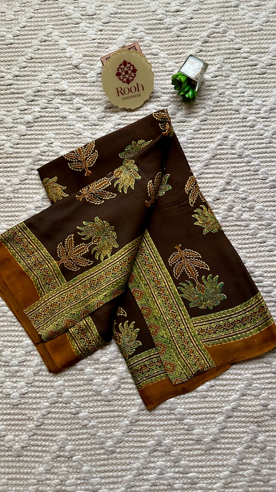 CINNAMON BLOSSOMS - DEEP BROWN PREMIUM AJRAKH HAND BLOCK PRINTED MODAL SILK SAREE(ONLY AVAILABLE ON PRE ORDER- DISPATCH TIME IS 30-45 DAYS)