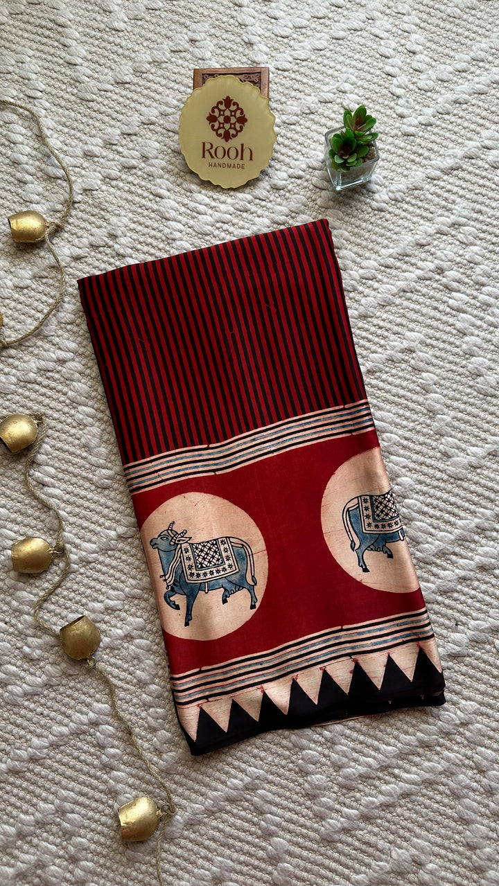 RED AND BLACK STRIPED PICHWAI - PREMIUM  AJRAKH HAND BLOCK PRINTED MODAL SILK SAREE (AVAILABLE ON PRE-ORDER - DISPATCH TIME IS 30-35 DAYS)