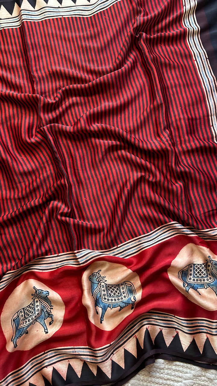 RED AND BLACK STRIPED PICHWAI - PREMIUM  AJRAKH HAND BLOCK PRINTED MODAL SILK SAREE (AVAILABLE ON PRE-ORDER - DISPATCH TIME IS 30-35 DAYS)