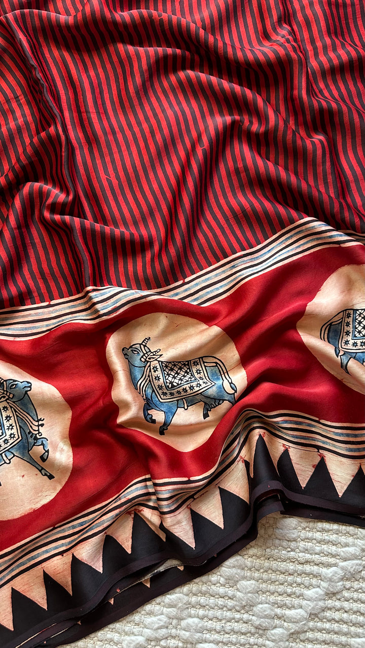 RED AND BLACK STRIPED PICHWAI - PREMIUM  AJRAKH HAND BLOCK PRINTED MODAL SILK SAREE (AVAILABLE ON PRE-ORDER - DISPATCH TIME IS 30-35 DAYS)