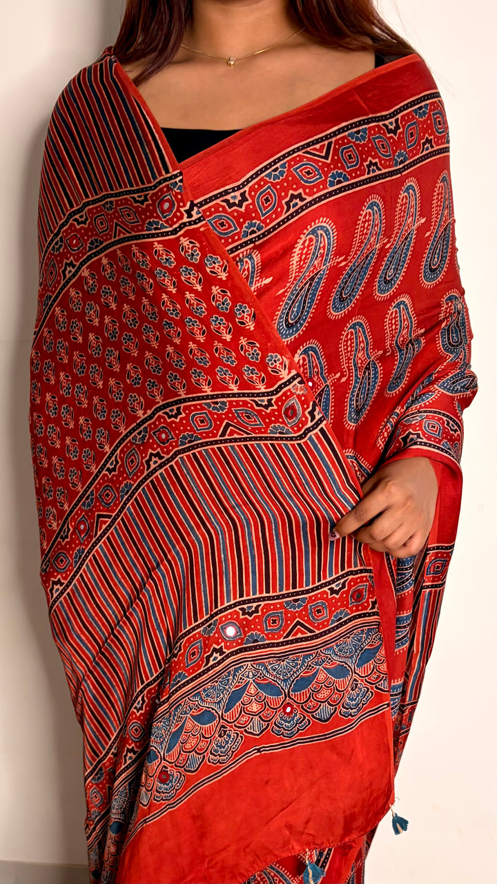 HEER - AJRAKH MADDER RED HAND BLOCK PRINTED PREMIUM MODAL SILK SAREE WITH MINIMAL MIRROR HAND-EMBROIDERY