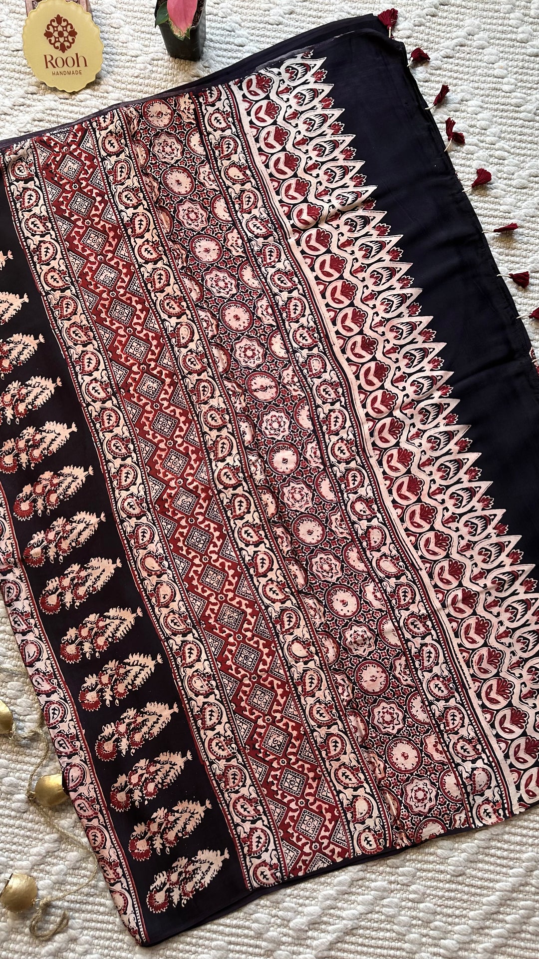 BLOSSOMS ON MIDNIGHT BLACK- SUPER PREMIUM & BUTTERY SOFT AJRAKH HAND BLOCK PRINTED MODAL SILK SAREE