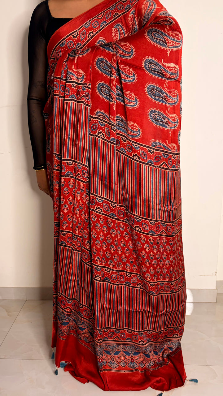 HEER - AJRAKH MADDER RED HAND BLOCK PRINTED PREMIUM MODAL SILK SAREE WITH MINIMAL MIRROR HAND-EMBROIDERY
