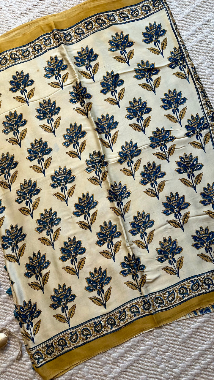 BLOSSOMS ON IVORY- SUPER PREMIUM & BUTTERY SOFT AJRAKH HAND BLOCK PRINTED MODAL SILK SAREE