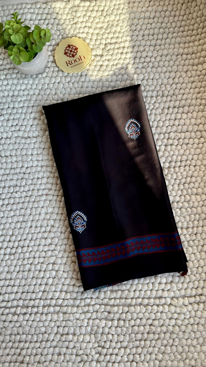 MIDNIGHT BLACK CHARMS  - AJRAKH HAND BLOCK PRINTED PREMIUM MODAL SILK SAREE