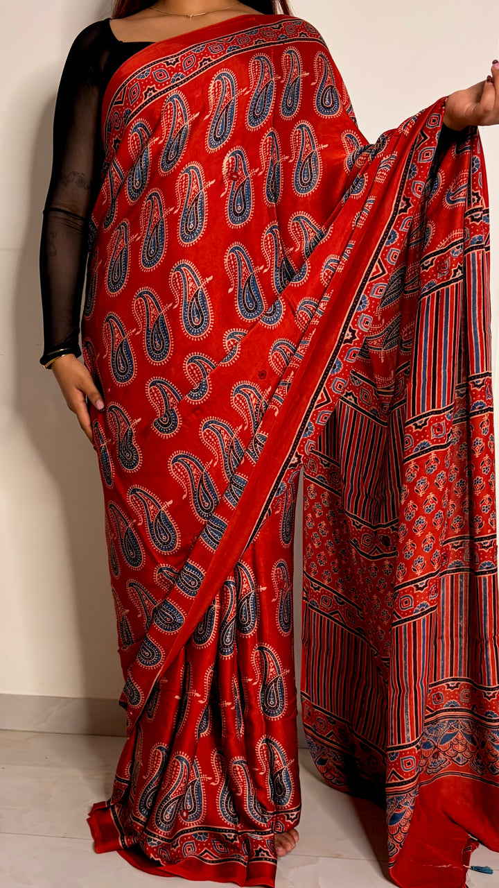 HEER - AJRAKH MADDER RED HAND BLOCK PRINTED PREMIUM MODAL SILK SAREE WITH MINIMAL MIRROR HAND-EMBROIDERY
