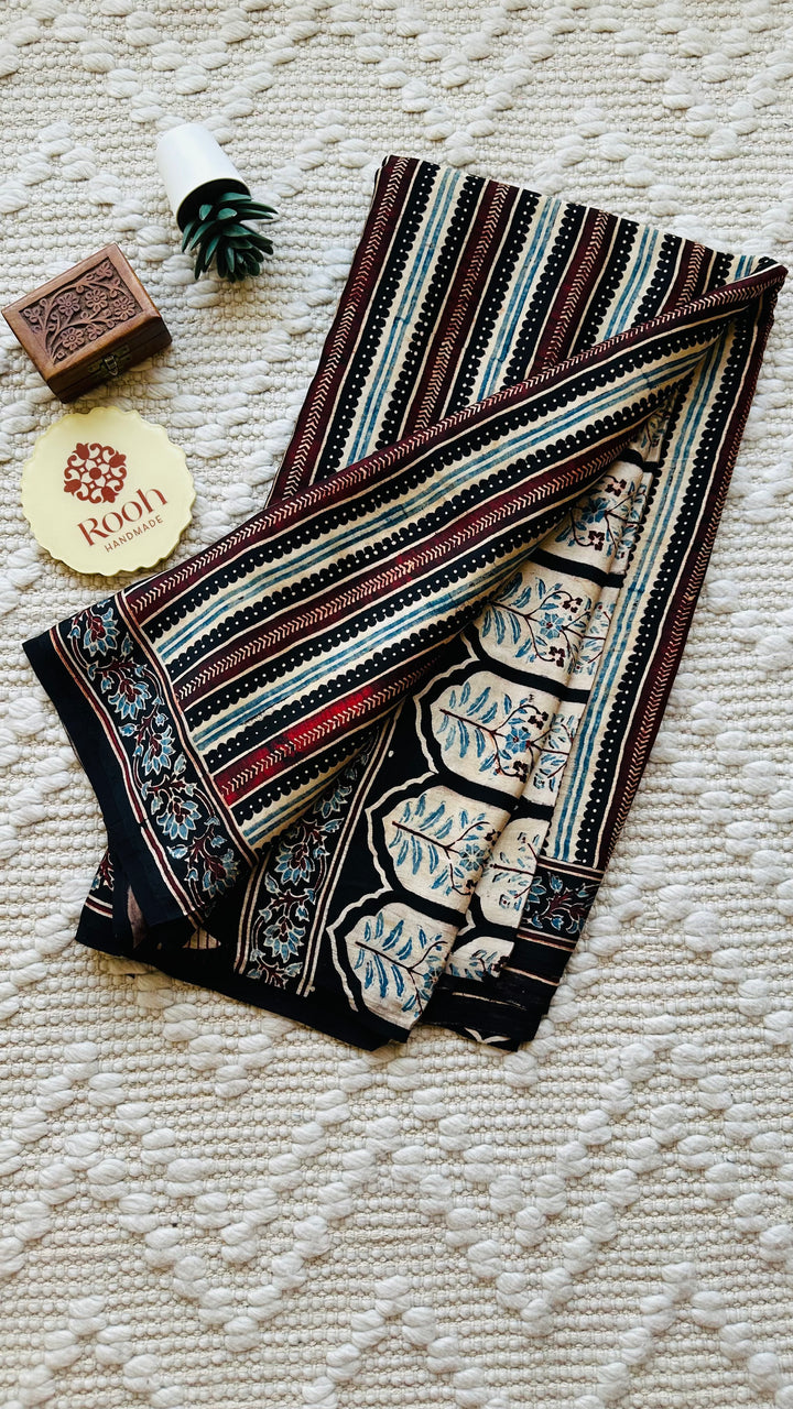 VRITIKA- BLACK STRIPED AJRAKH HAND BLOCK PRINTED PREMIUM MODAL SILK SAREE (ONLY AVAILABLE ON PRE ORDER- DISPATCH TIME IS 45-50 DAYS)