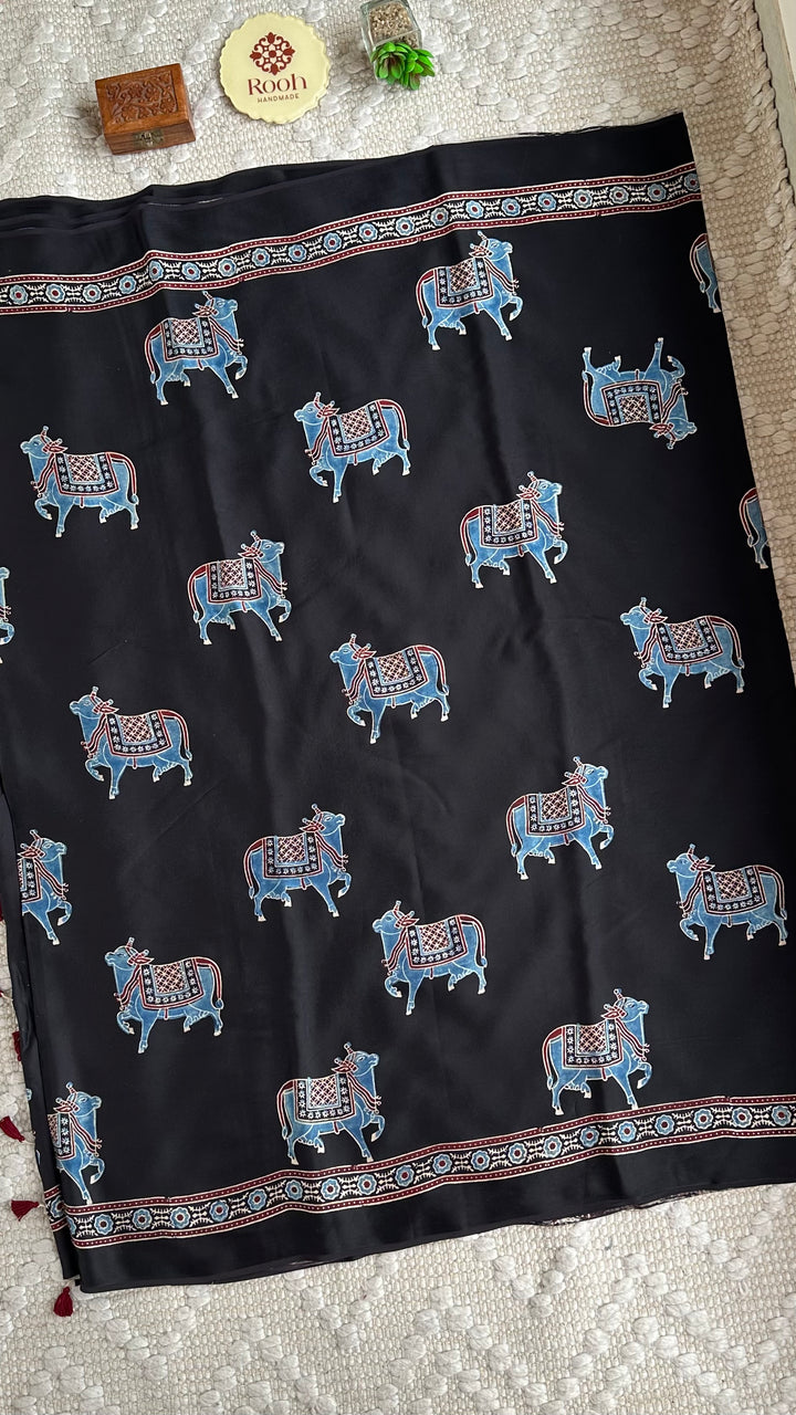 BLUE NANDI PICHWAI - BLACK PREMIUM AJRAKH HAND BLOCK PRINTED MODAL SILK SAREE (ONLY AVAILABLE ON PRE ORDER - DISPATCH TIME IS 30-40 DAYS)