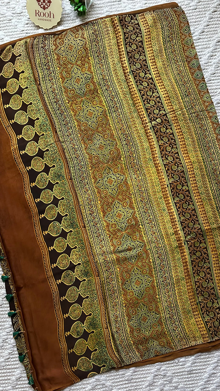 CINNAMON BLOSSOMS - DEEP BROWN PREMIUM AJRAKH HAND BLOCK PRINTED MODAL SILK SAREE(ONLY AVAILABLE ON PRE ORDER- DISPATCH TIME IS 30-45 DAYS)