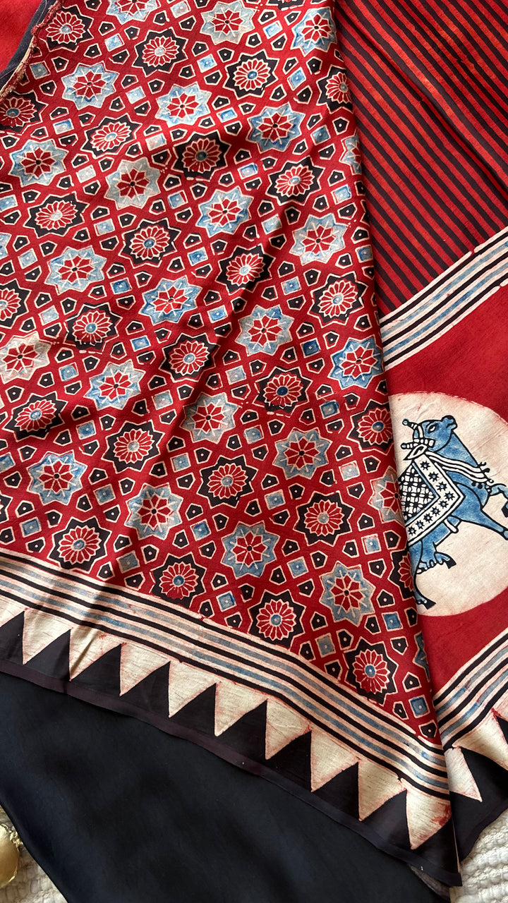 RED AND BLACK STRIPED PICHWAI - PREMIUM  AJRAKH HAND BLOCK PRINTED MODAL SILK SAREE (AVAILABLE ON PRE-ORDER - DISPATCH TIME IS 30-35 DAYS)