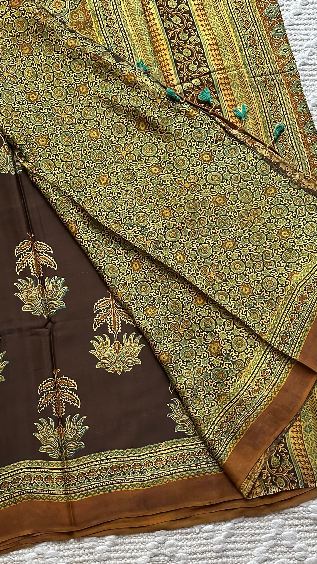 CINNAMON BLOSSOMS - DEEP BROWN PREMIUM AJRAKH HAND BLOCK PRINTED MODAL SILK SAREE(ONLY AVAILABLE ON PRE ORDER- DISPATCH TIME IS 30-45 DAYS)