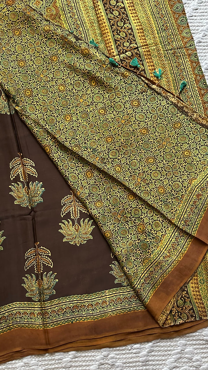 CINNAMON BLOSSOMS - DEEP BROWN PREMIUM AJRAKH HAND BLOCK PRINTED MODAL SILK SAREE(ONLY AVAILABLE ON PRE ORDER- DISPATCH TIME IS 30-45 DAYS)