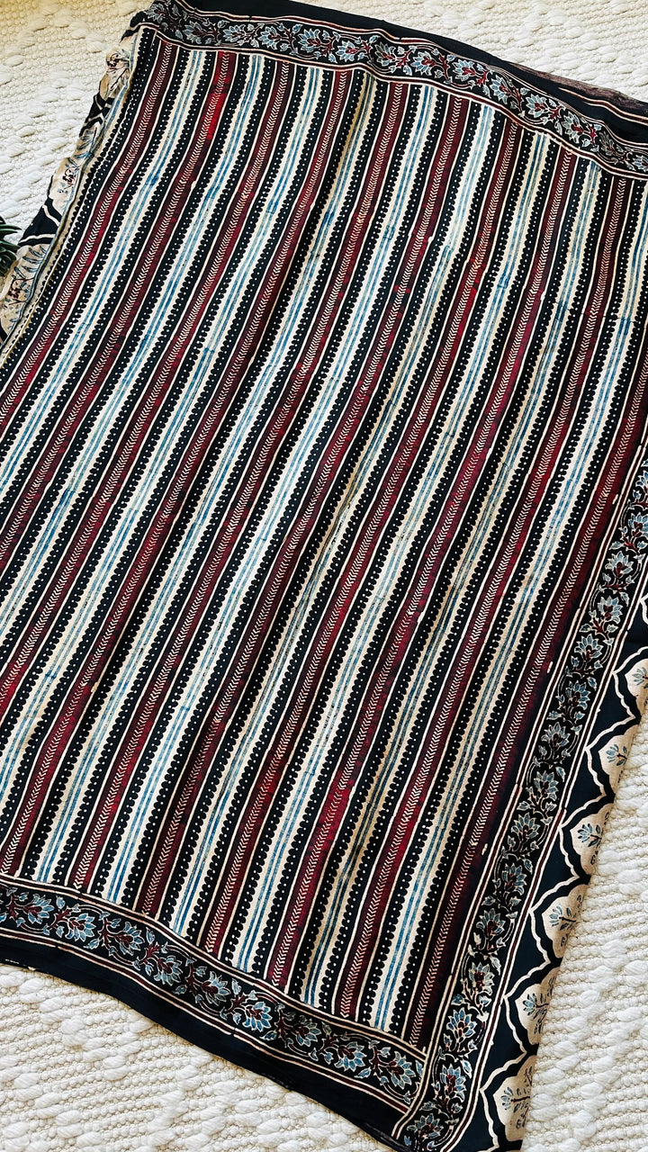 VRITIKA- BLACK STRIPED AJRAKH HAND BLOCK PRINTED PREMIUM MODAL SILK SAREE (ONLY AVAILABLE ON PRE ORDER- DISPATCH TIME IS 45-50 DAYS)