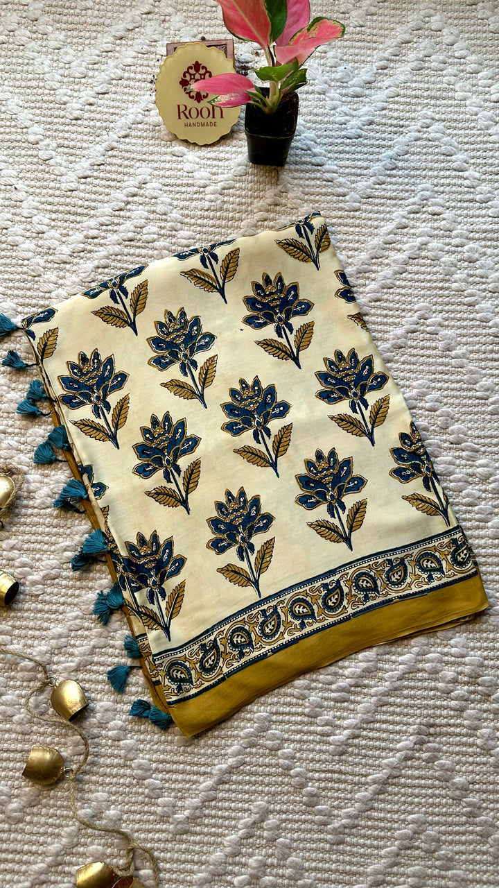 BLOSSOMS ON IVORY- SUPER PREMIUM & BUTTERY SOFT AJRAKH HAND BLOCK PRINTED MODAL SILK SAREE