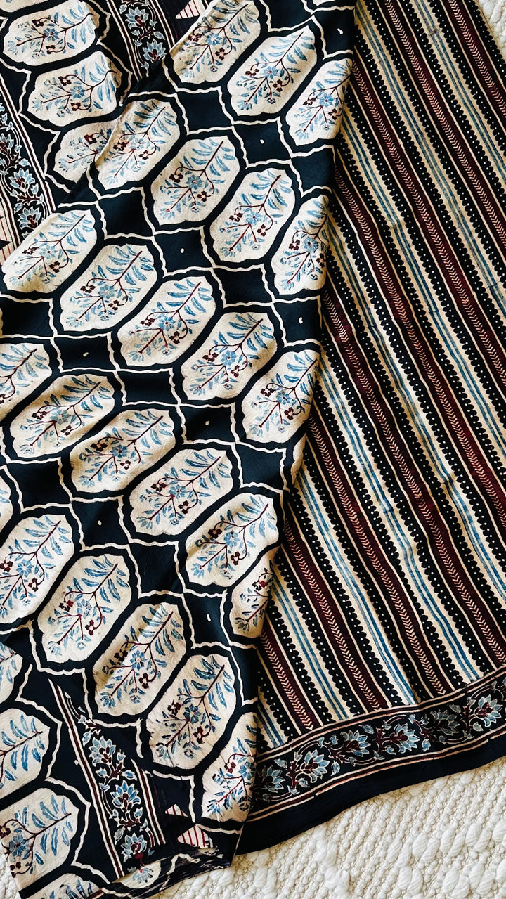 VRITIKA- BLACK STRIPED AJRAKH HAND BLOCK PRINTED PREMIUM MODAL SILK SAREE (ONLY AVAILABLE ON PRE ORDER- DISPATCH TIME IS 45-50 DAYS)