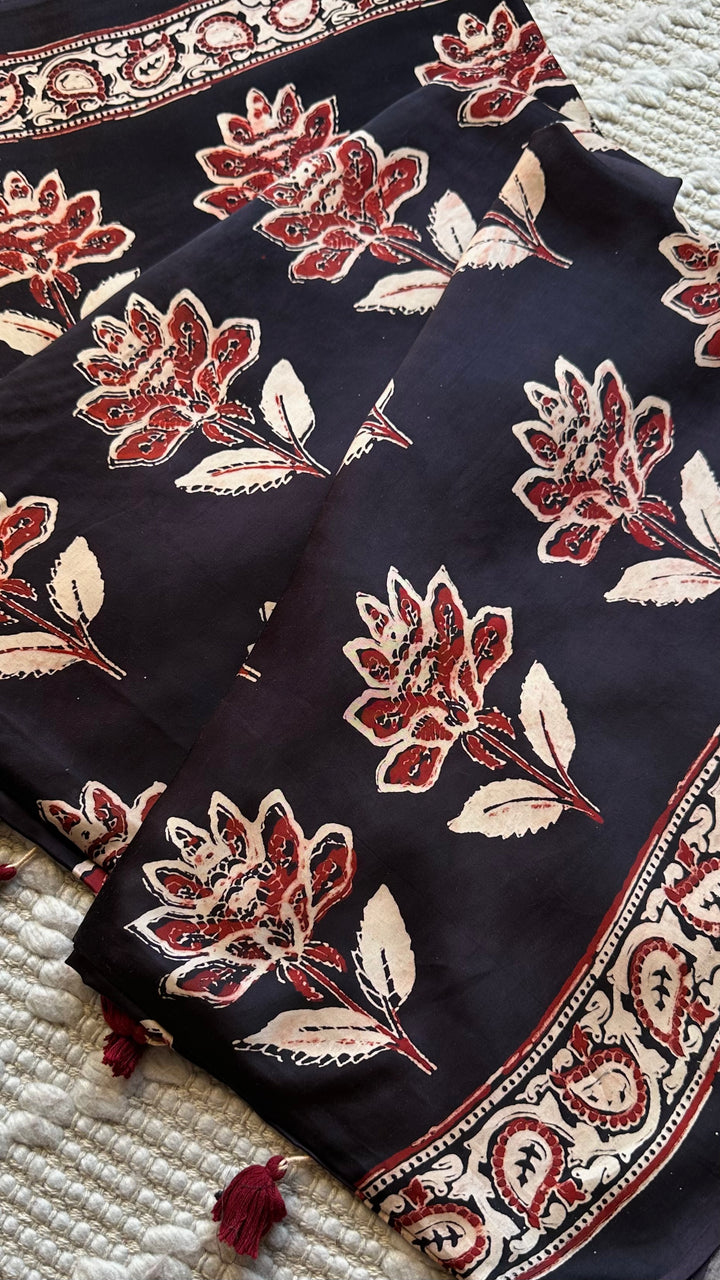 BLOSSOMS ON MIDNIGHT BLACK- SUPER PREMIUM & BUTTERY SOFT AJRAKH HAND BLOCK PRINTED MODAL SILK SAREE