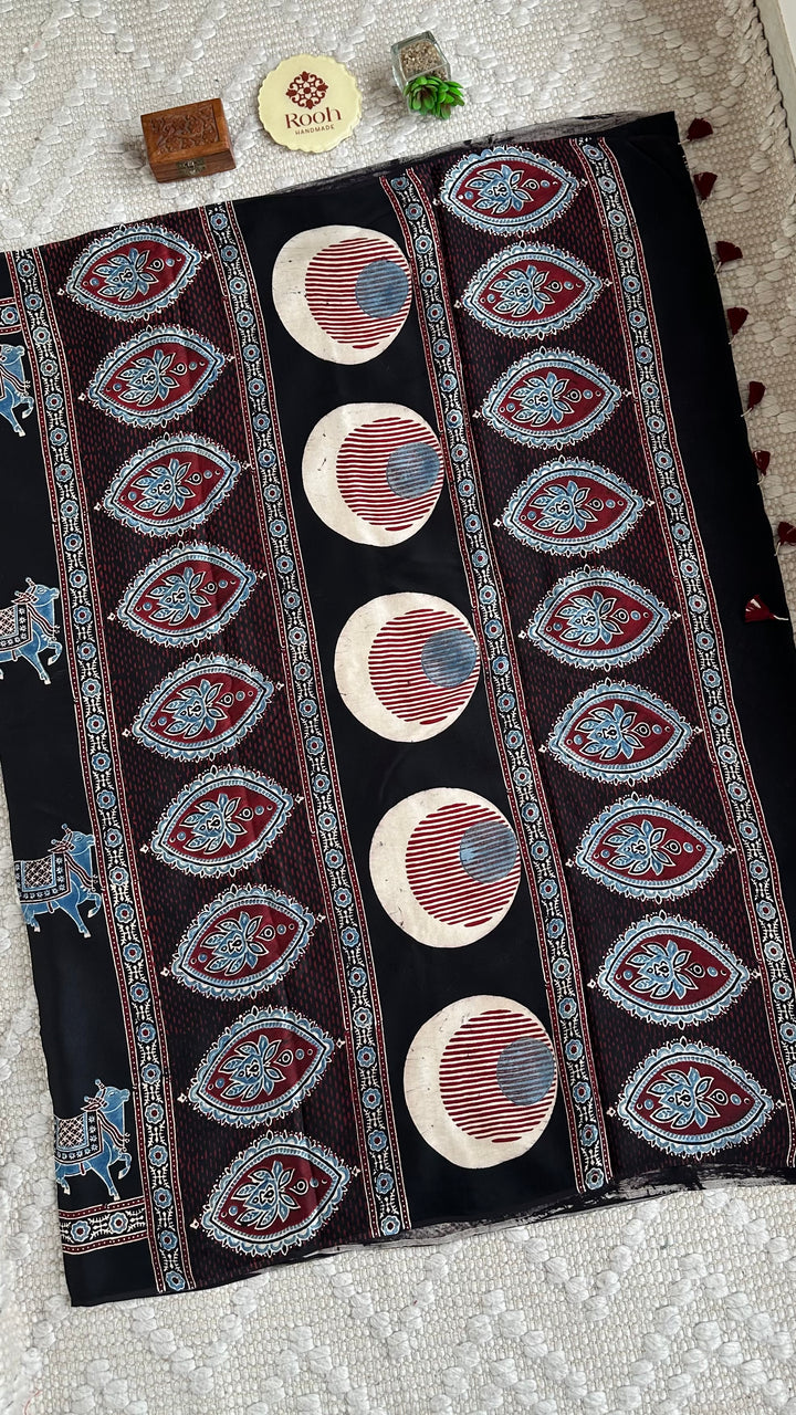 BLUE NANDI PICHWAI - BLACK PREMIUM AJRAKH HAND BLOCK PRINTED MODAL SILK SAREE (ONLY AVAILABLE ON PRE ORDER - DISPATCH TIME IS 30-40 DAYS)