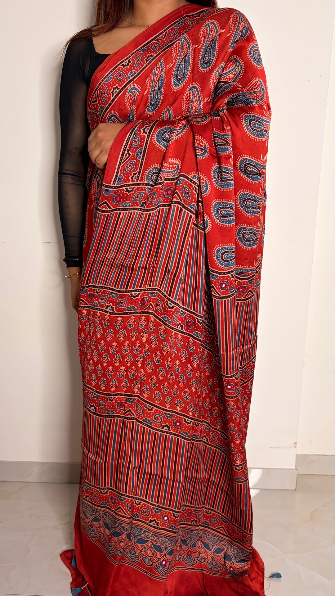 HEER - AJRAKH MADDER RED HAND BLOCK PRINTED PREMIUM MODAL SILK SAREE WITH MINIMAL MIRROR HAND-EMBROIDERY