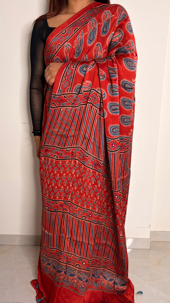 HEER - AJRAKH MADDER RED HAND BLOCK PRINTED PREMIUM MODAL SILK SAREE WITH MINIMAL MIRROR HAND-EMBROIDERY