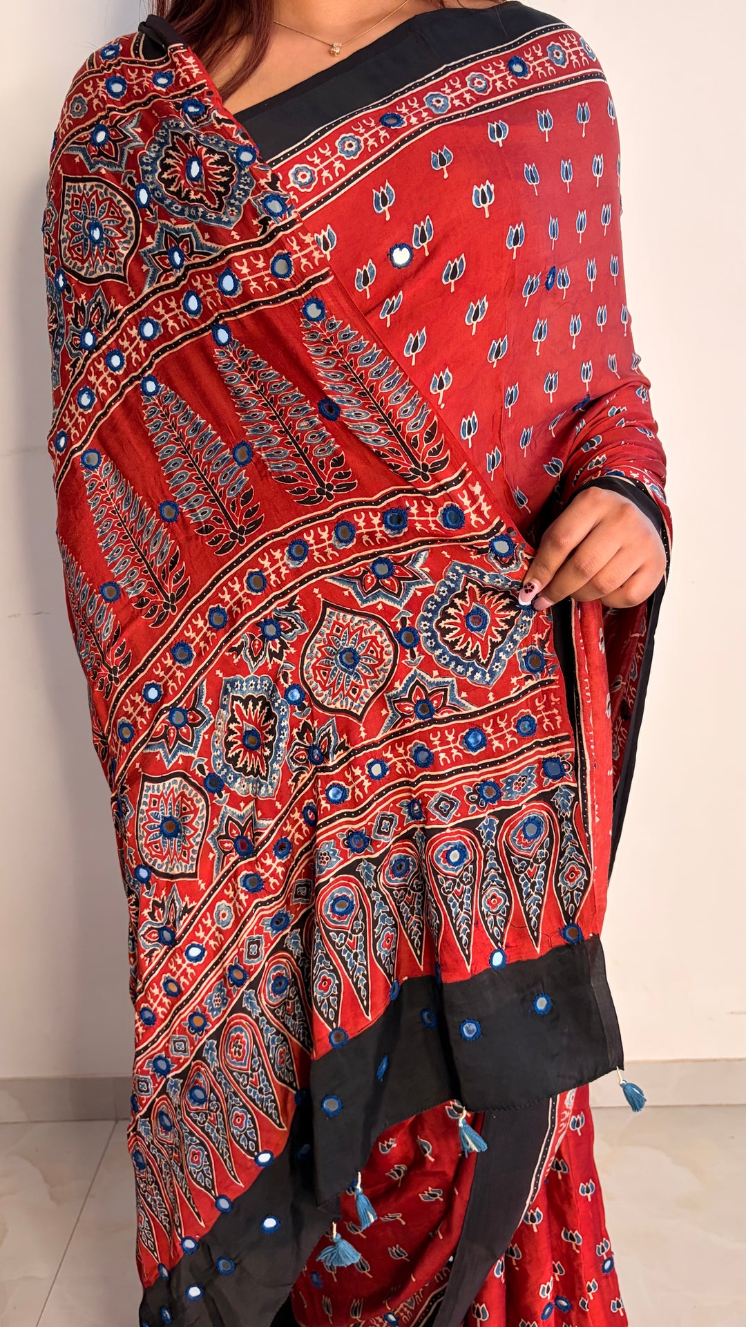 NOOR- AJRAKH MADDER RED HAND BLOCK PRINTED PREMIUM MODAL SILK SAREE WITH MIRROR HAND-EMBROIDERY (ONLY AVAILABLE ON PRE-ORDER - DISPATCH TIME IS 20-25 DAYS)