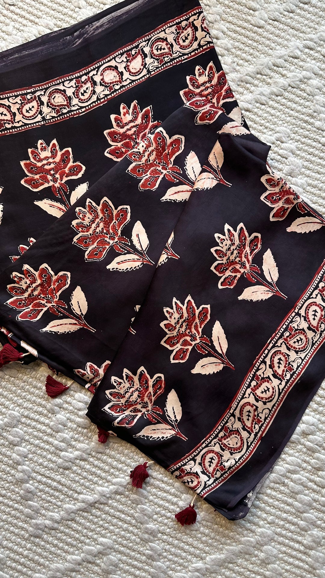 BLOSSOMS ON MIDNIGHT BLACK- SUPER PREMIUM & BUTTERY SOFT AJRAKH HAND BLOCK PRINTED MODAL SILK SAREE
