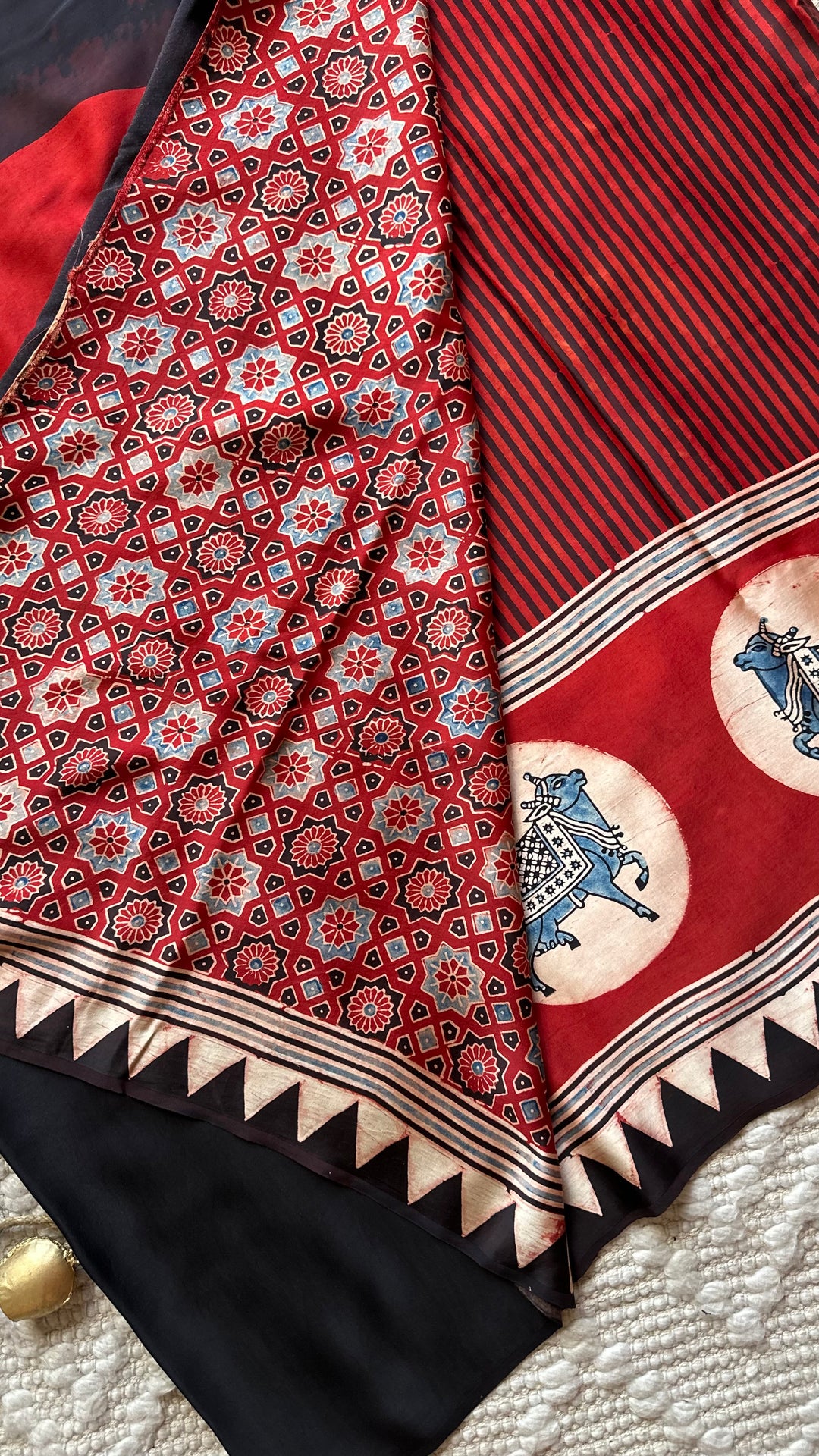 RED AND BLACK STRIPED PICHWAI - PREMIUM  AJRAKH HAND BLOCK PRINTED MODAL SILK SAREE (AVAILABLE ON PRE-ORDER - DISPATCH TIME IS 30-35 DAYS)