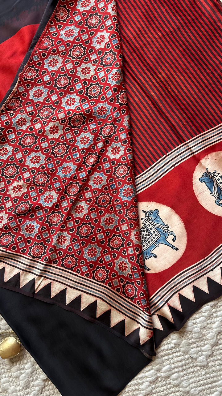 RED AND BLACK STRIPED PICHWAI - PREMIUM  AJRAKH HAND BLOCK PRINTED MODAL SILK SAREE (AVAILABLE ON PRE-ORDER - DISPATCH TIME IS 30-35 DAYS)