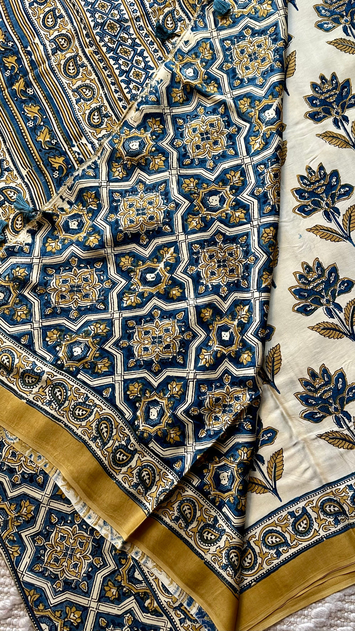 BLOSSOMS ON IVORY- SUPER PREMIUM & BUTTERY SOFT AJRAKH HAND BLOCK PRINTED MODAL SILK SAREE