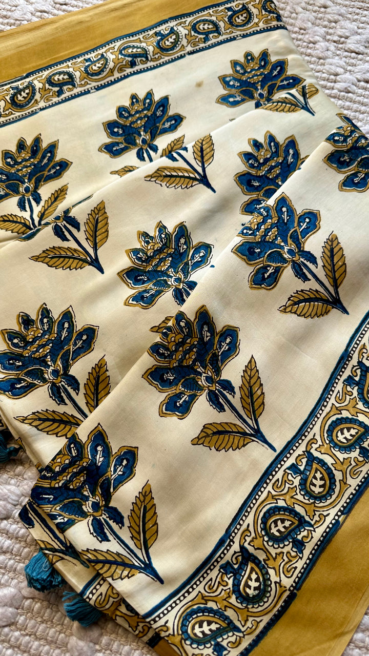 BLOSSOMS ON IVORY- SUPER PREMIUM & BUTTERY SOFT AJRAKH HAND BLOCK PRINTED MODAL SILK SAREE