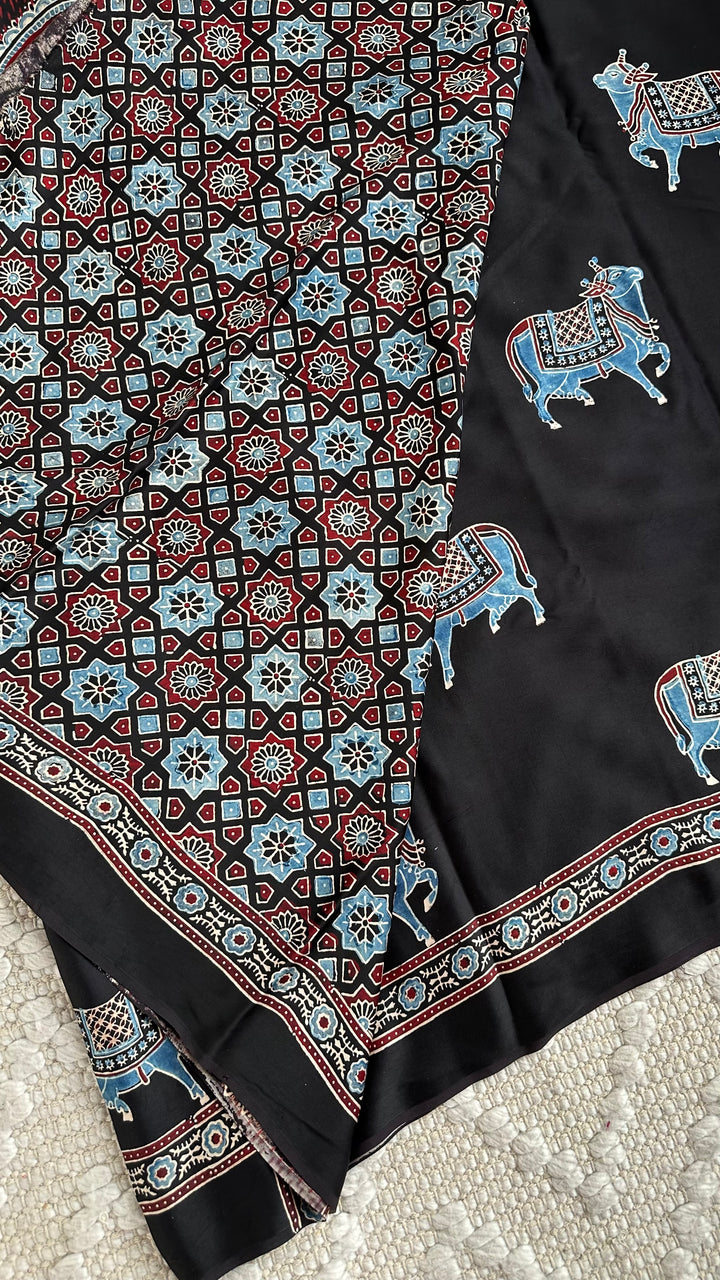 BLUE NANDI PICHWAI - BLACK PREMIUM AJRAKH HAND BLOCK PRINTED MODAL SILK SAREE (ONLY AVAILABLE ON PRE ORDER - DISPATCH TIME IS 30-40 DAYS)