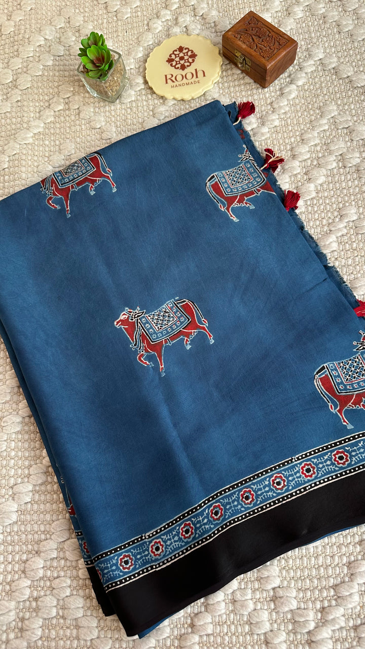 INDIGO PICHWAI NANDI - AJRAKH HAND BLOCK PRINTED MODAL SILK SAREE (ONLY AVAILABLE ON PRE ORDER- DISPATCH TIME IS 30-35 DAYS)